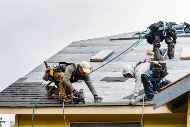 Professional Gutter Installation technician working in Redwood, OR